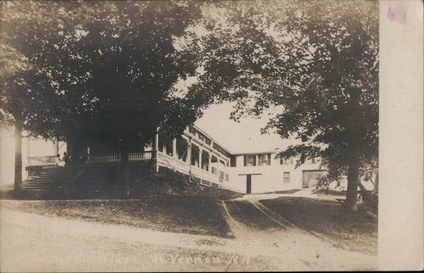 House with veranda between two trees Mont Vernon, NH Postcard