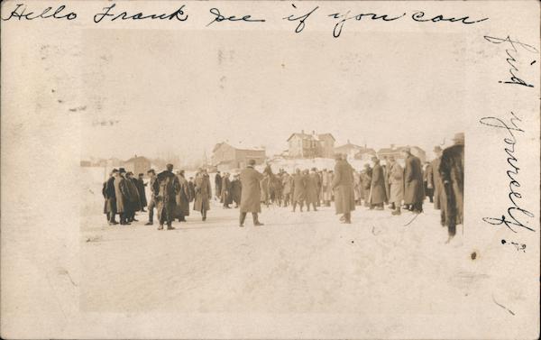 Townspeople gather outside snowy village New York Men Postcard