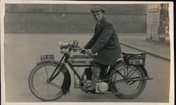 Man posing on motorcycle British? Postcard