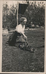 Young Woman Feeding Brood of Ducklings or Chickens Postcard