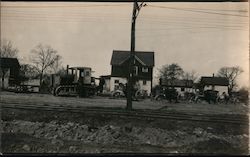 Construction Next to Town and Railroad Tracks Postcard