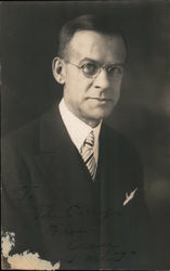 Studio Portrait of a Man Wearing Glasses Postcard