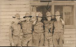 Five Men In Uniform Standing in front of a Building with Arms Around Each Others' Shoulders World War I Postcard Postcard Postcard