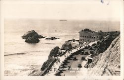 Cliff House and Seal Rocks with a ship in the distance San Francisco, CA Postcard Postcard Postcard