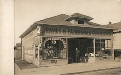 Graves & Fairbanks Grocers - a man stands in front of the store Postcard