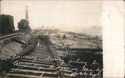 Causeway, driving piling for bridge - Hurricane Damage August 16, 1915 Postcard