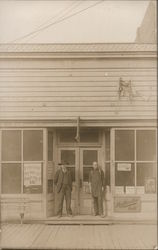 Men in Storefront Doorway Postcard