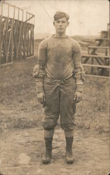 Football Player Standing in Front of Bleachers Postcard Postcard Postcard