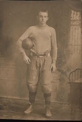 Boy Clutching Football Under Arm Postcard