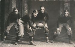 Four Football Players Crouching with Ball Studio Photo Postcard Postcard Postcard