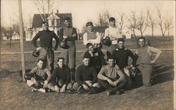 Football Team Posing in Front of Thin Trees Iowa Postcard Postcard Postcard