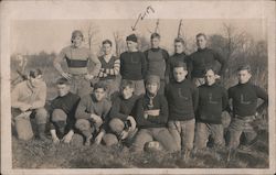 Football Team Kneeling in Field, 1913 Postcard