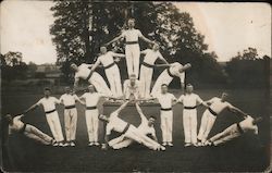 Male Gymnastics Team in a Pyramidal Structure Pose Postcard Postcard Postcard