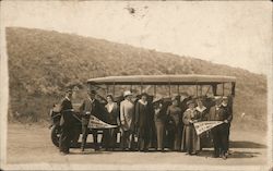 Group with Tour Bus at Border Postcard