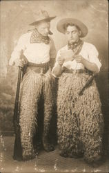 Two Young Men Dressed as Cowboys Wearing Wooly Chaps Postcard