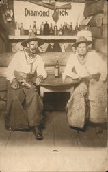 Two Men Dressed as Cowboys at Table, Diamond Nich Bar Postcard