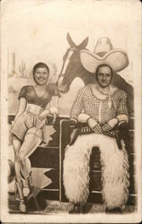 Heads Through Holes: Cowboy and Woman Postcard