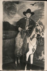 Man Dressed as Cowboy Wooly Chaps, Holding Pistol on Fake Horse Postcard