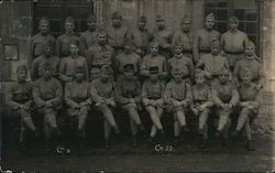 Group of Soldiers in Front of an Old Building Postcard