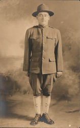 Soldier Standing Alone on a Photo Studio, 1917 WWI-era Postcard